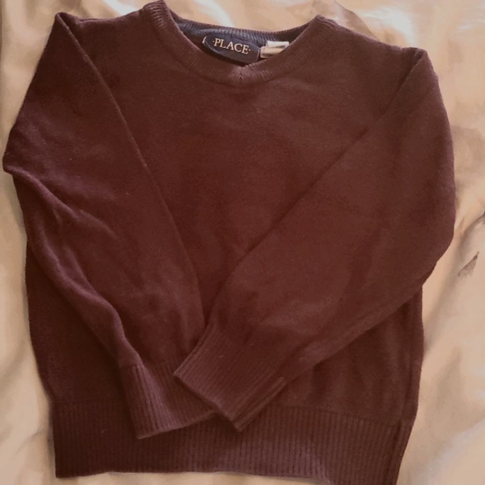 Plum colored boys sweater.